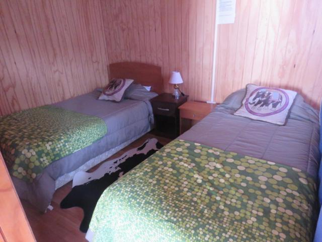 Hostal Y Cabanas Peumayen Puerto Guadal Bagian luar foto